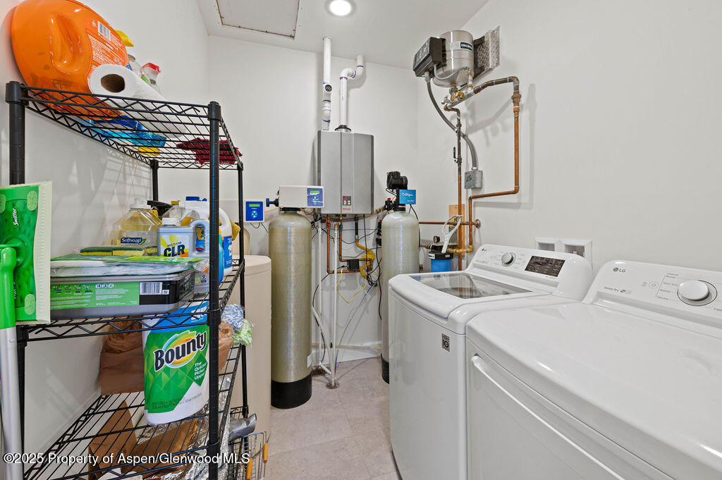53404 Highway 330 Collbran, CO 81624 - Photo 22 of 43 a utility room with dryer and washer