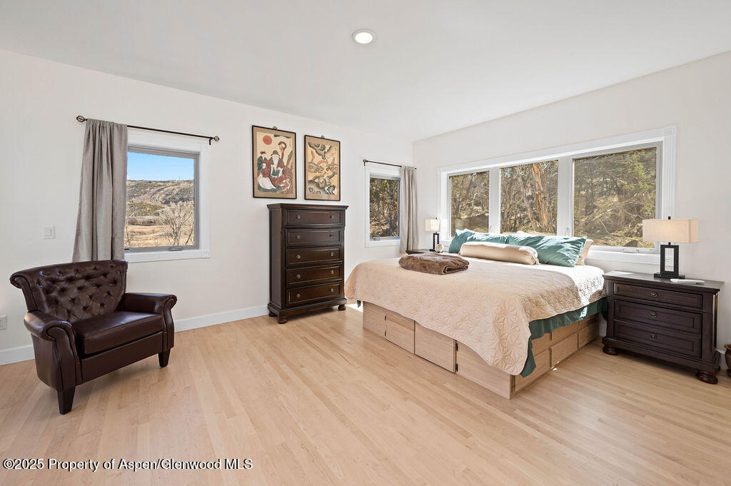 53404 Highway 330 Collbran, CO 81624 - Photo 27 of 43 a bedroom with a bed and a couch