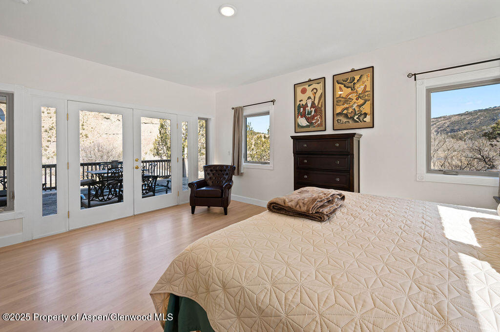 53404 Highway 330 Collbran, CO 81624 - Photo 29 of 43 a bedroom with a bed and furniture