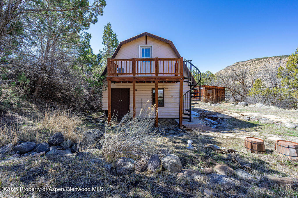 53404 Highway 330 Collbran, CO 81624 - Photo 3 of 43 a view of a small house with a yard
