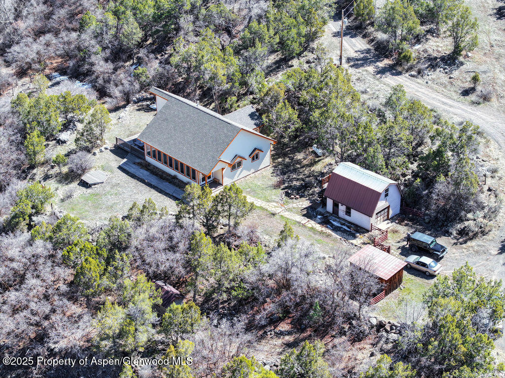 53404 Highway 330 Collbran, CO 81624 - Photo 33 of 43 an aerial view of house with yard and swimming pool