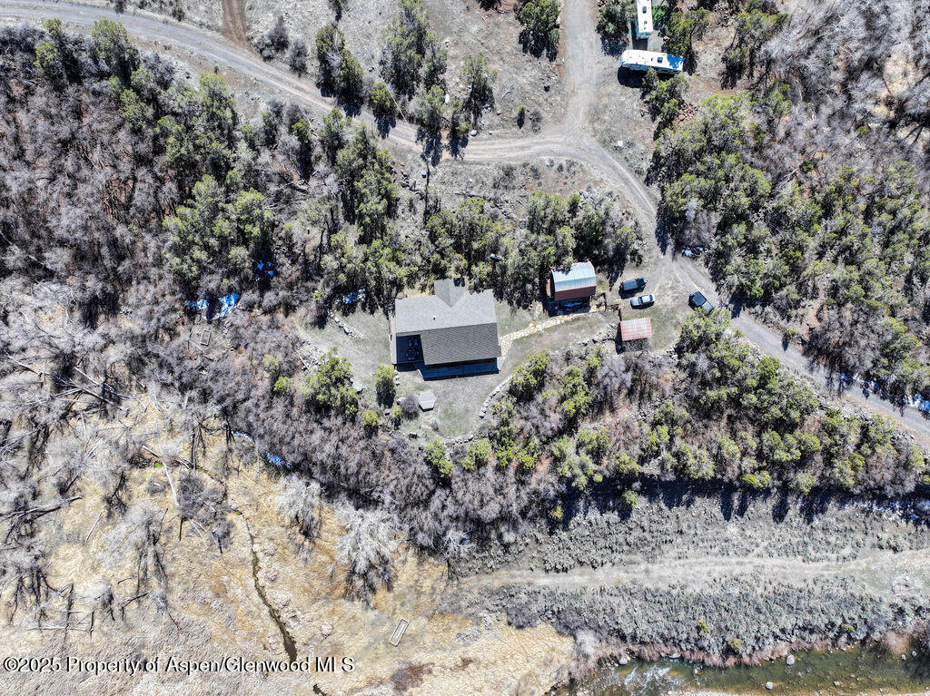 53404 Highway 330 Collbran, CO 81624 - Photo 38 of 43 a view of a house with a yard