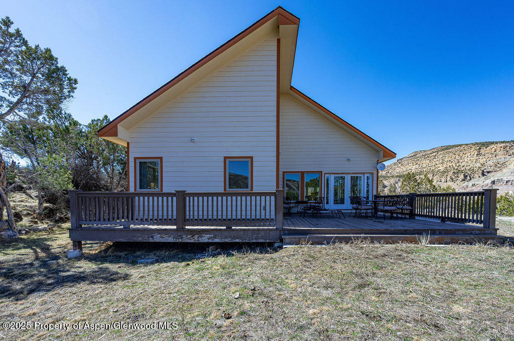 53404 Highway 330 Collbran, CO 81624 - Photo 8 of 43 a view of a house with wooden fence