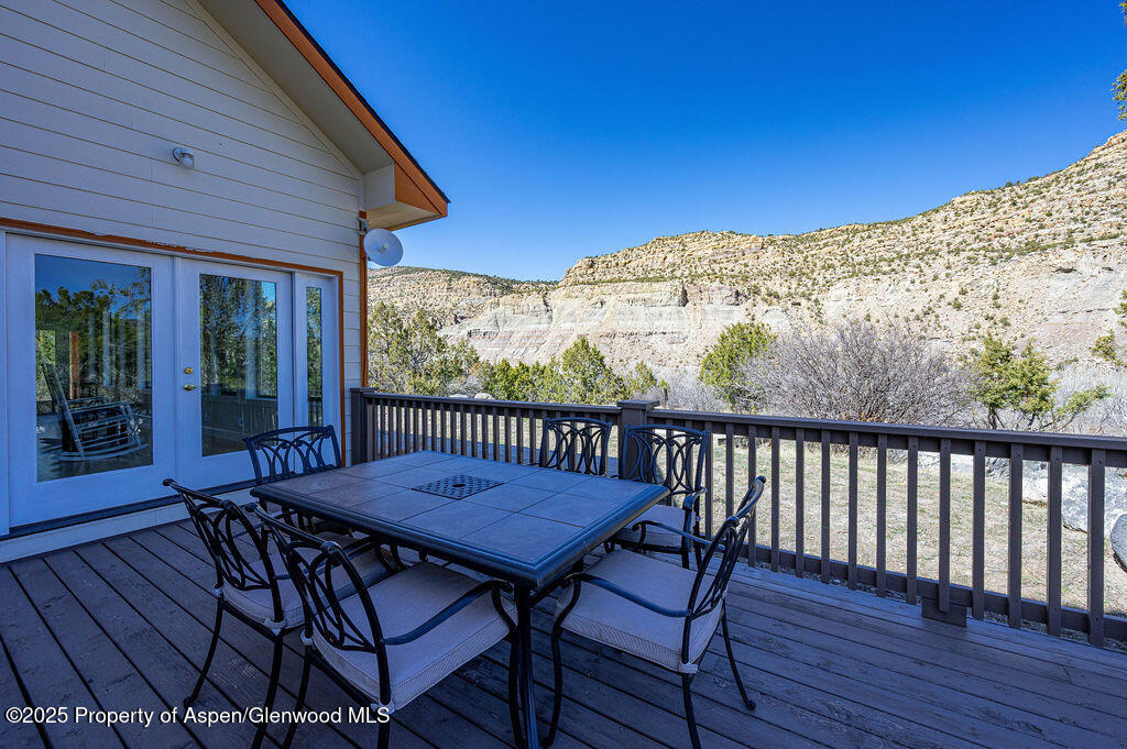 53404 Highway 330 Collbran, CO 81624 - Photo 10 of 43 a view of a chairs and table in the patio