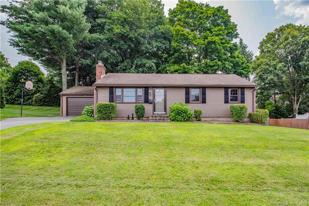 16 Palmer Road Portland, CT 06480 - Photo 1 of 1 a front view of a house with garden