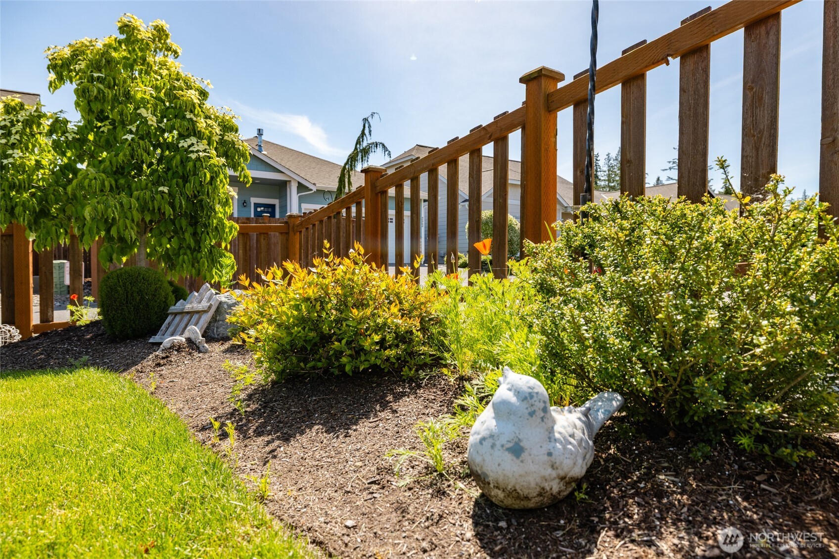 232 Sinclair Alley Mount Vernon, WA 98274 - Photo 24 of 33 a flower plants with wooden fence