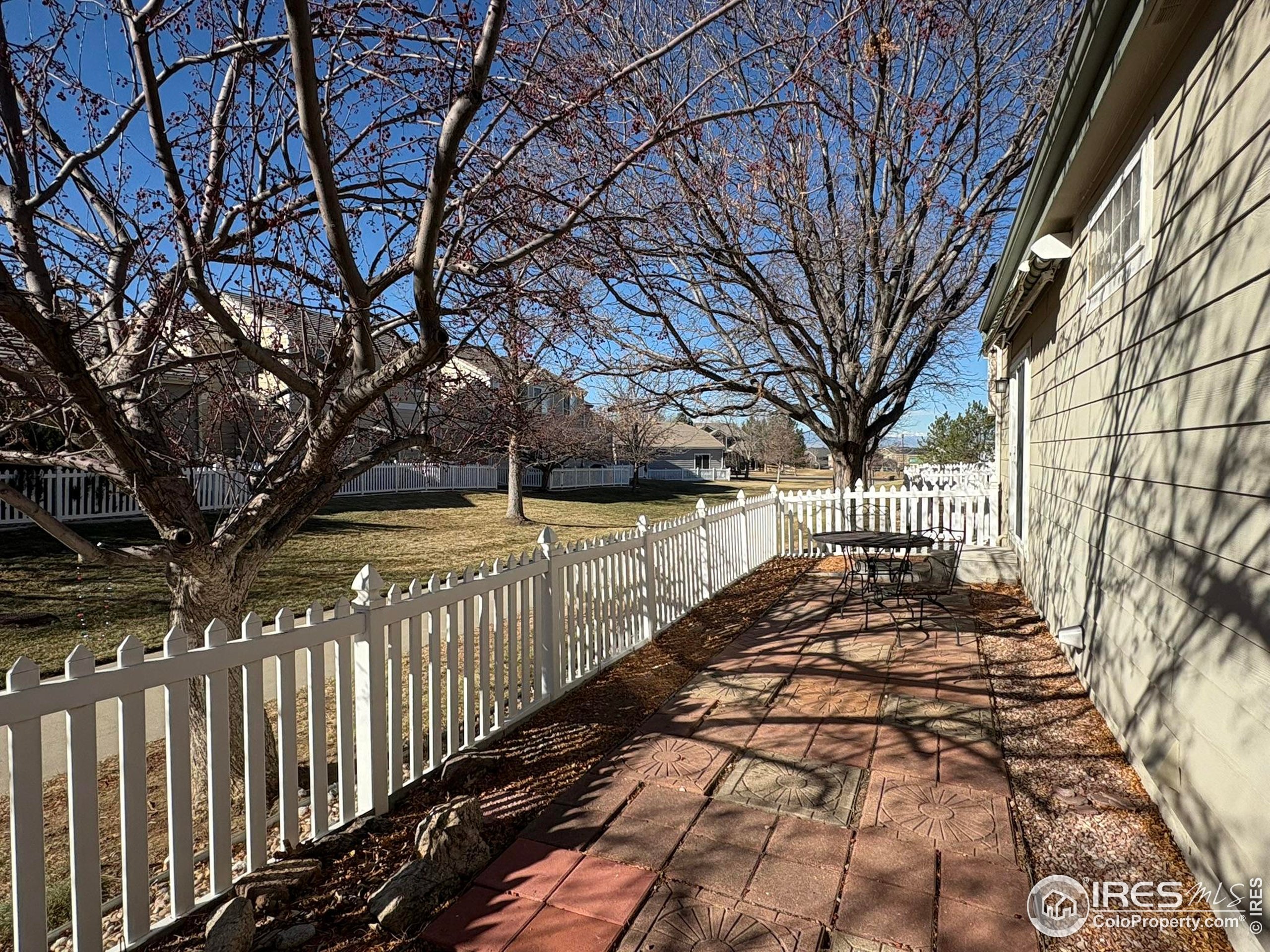 13963 Cook Street Thornton, CO 80602 - Photo 18 of 18 a view of a pathway with a yard