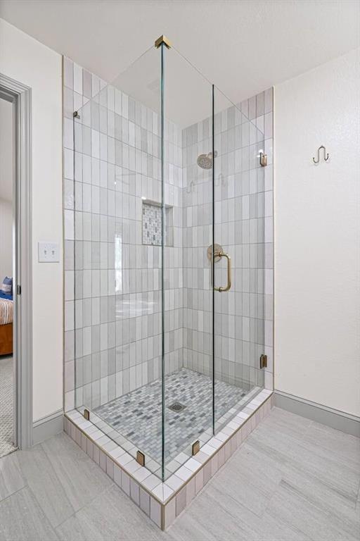 4918 Farris Road Denton, TX 76208 - Photo 23 of 28 a bathroom with a shower