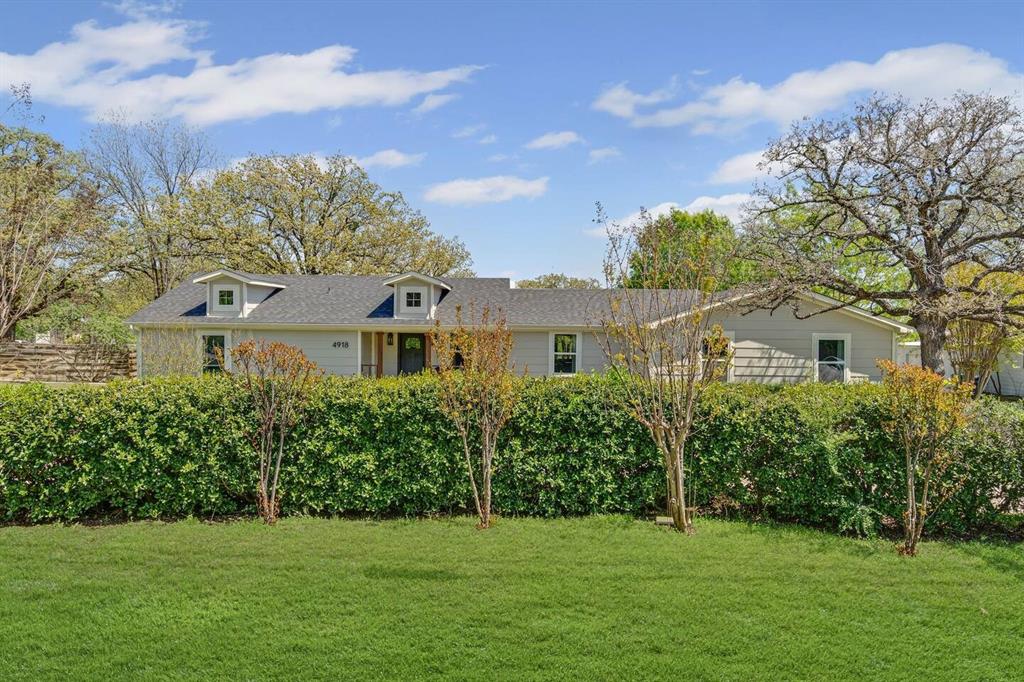 4918 Farris Road Denton, TX 76208 - Photo 3 of 28 a front view of a house with a garden