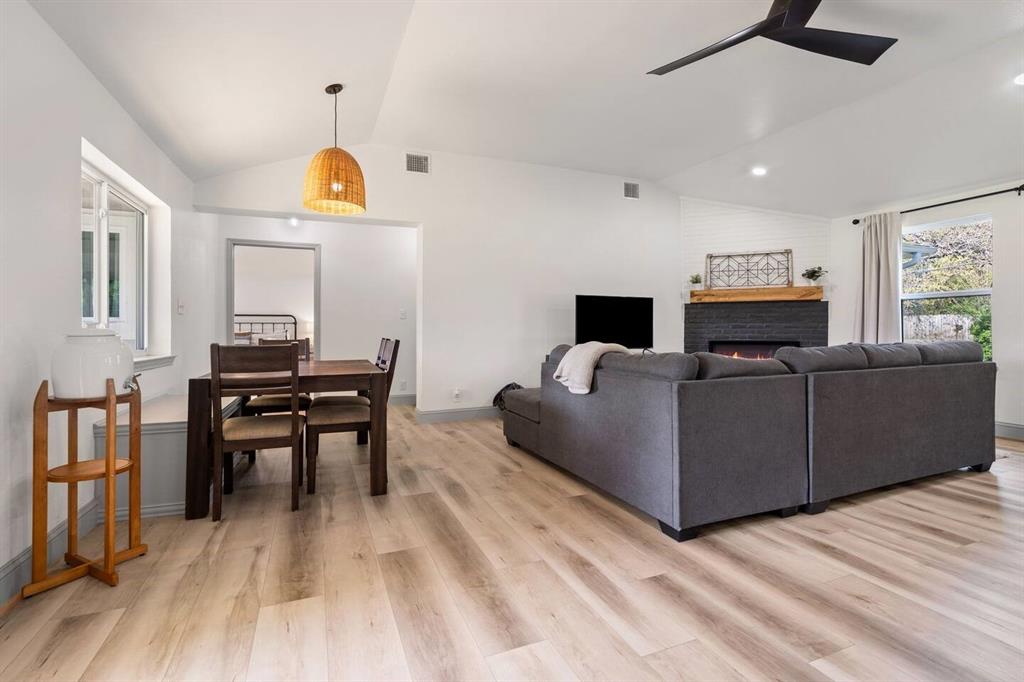 4918 Farris Road Denton, TX 76208 - Photo 8 of 28 a living room with furniture and a wooden floor