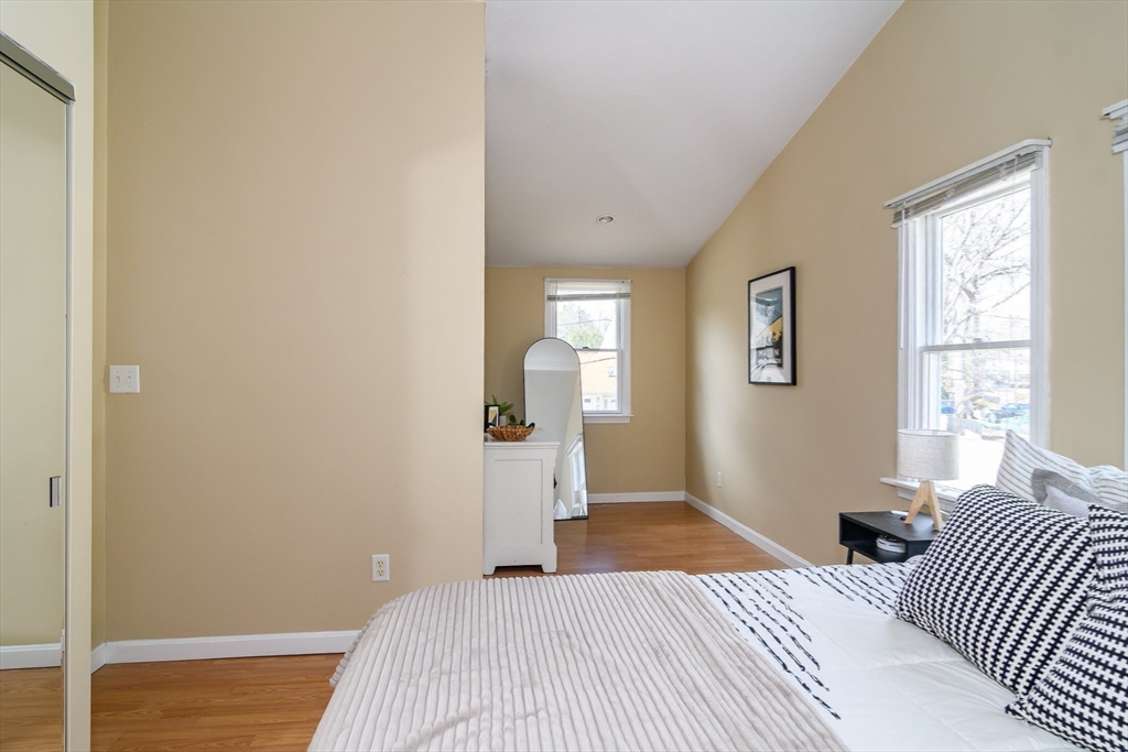 12 Vernon Road Natick, MA 01760 - Photo 14 of 25 a bedroom with a bed and a window