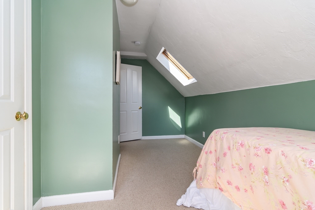 12 Vernon Road Natick, MA 01760 - Photo 17 of 25 a view of a hallway with stairs