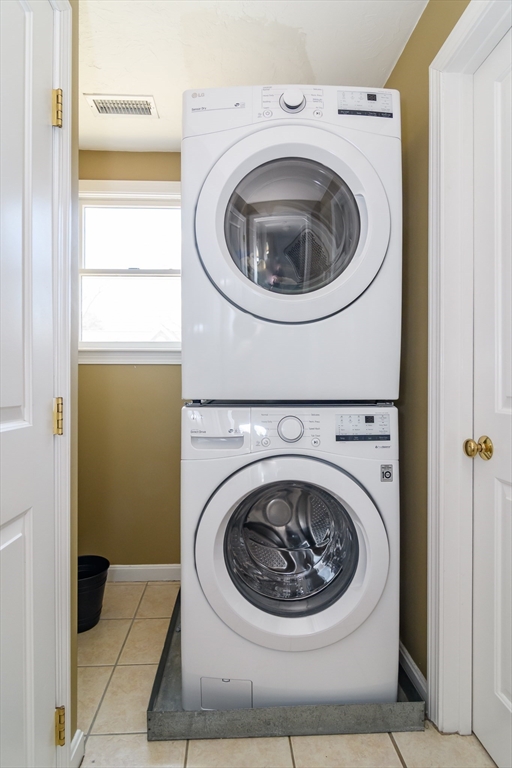 12 Vernon Road Natick, MA 01760 - Photo 19 of 25 a utility room with dryer and washer