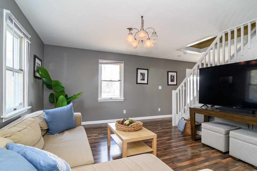 12 Vernon Road Natick, MA 01760 - Photo 8 of 25 a living room with furniture and a flat screen tv
