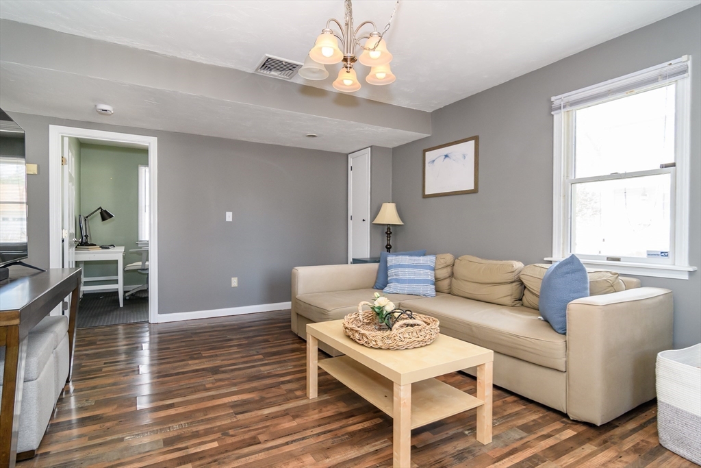 12 Vernon Road Natick, MA 01760 - Photo 9 of 25 a living room with furniture and a wooden floor
