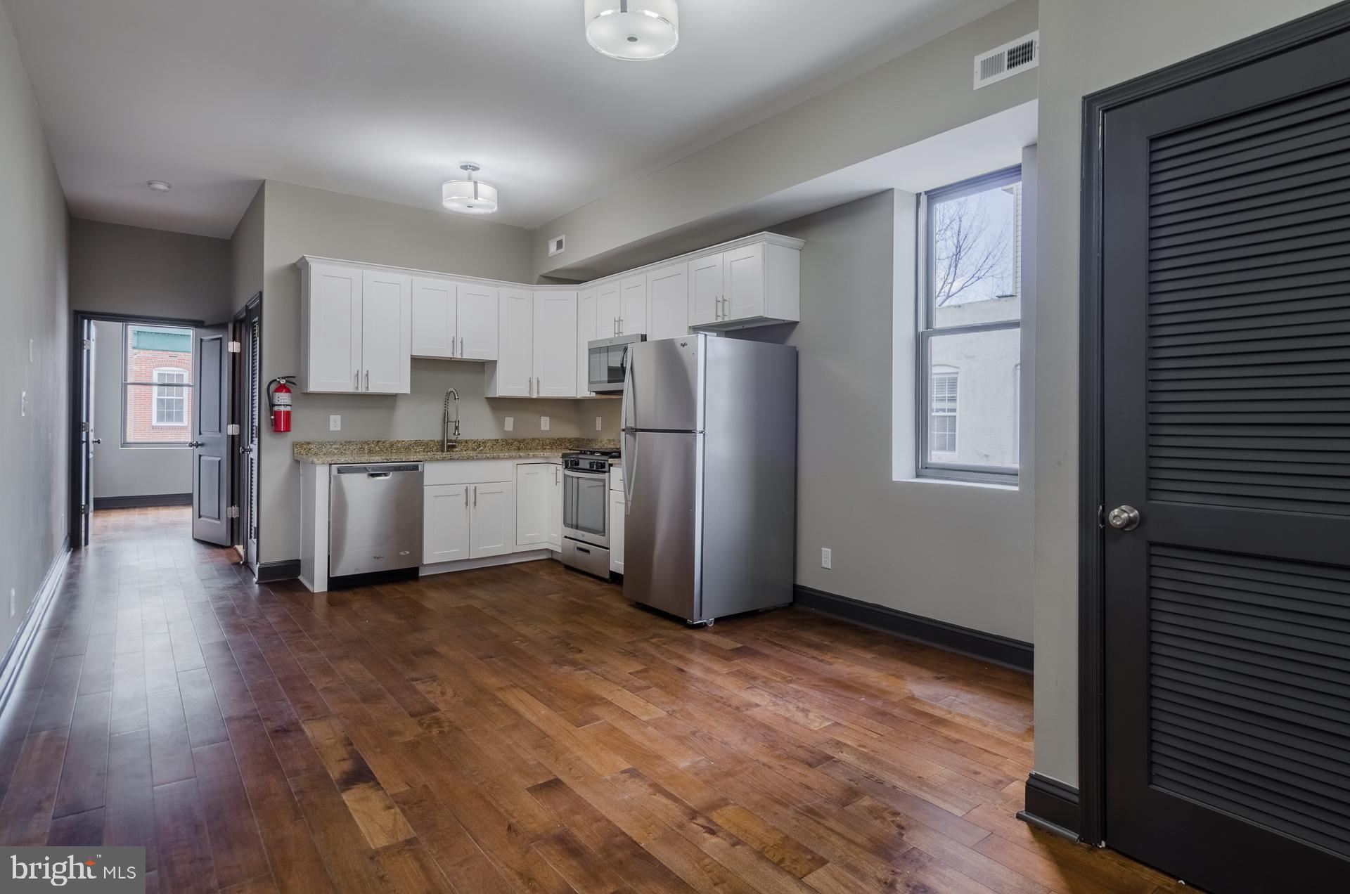 8 West Barney Street Baltimore, MD 21230 - Photo 26 of 37 Unit 2 Living Room/Kitchen