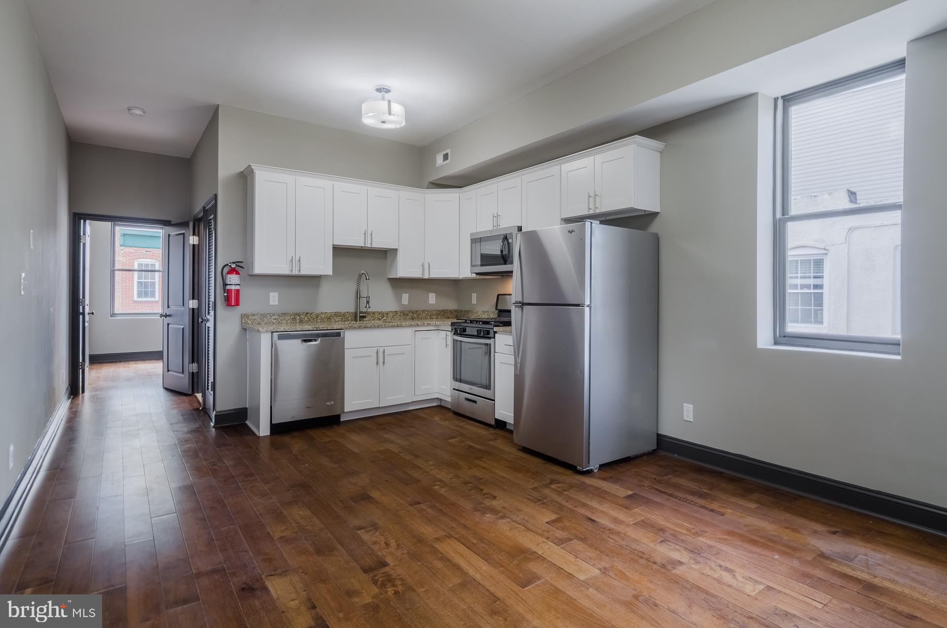 8 West Barney Street Baltimore, MD 21230 - Photo 27 of 37 Unit 2 Living Room/Kitchen