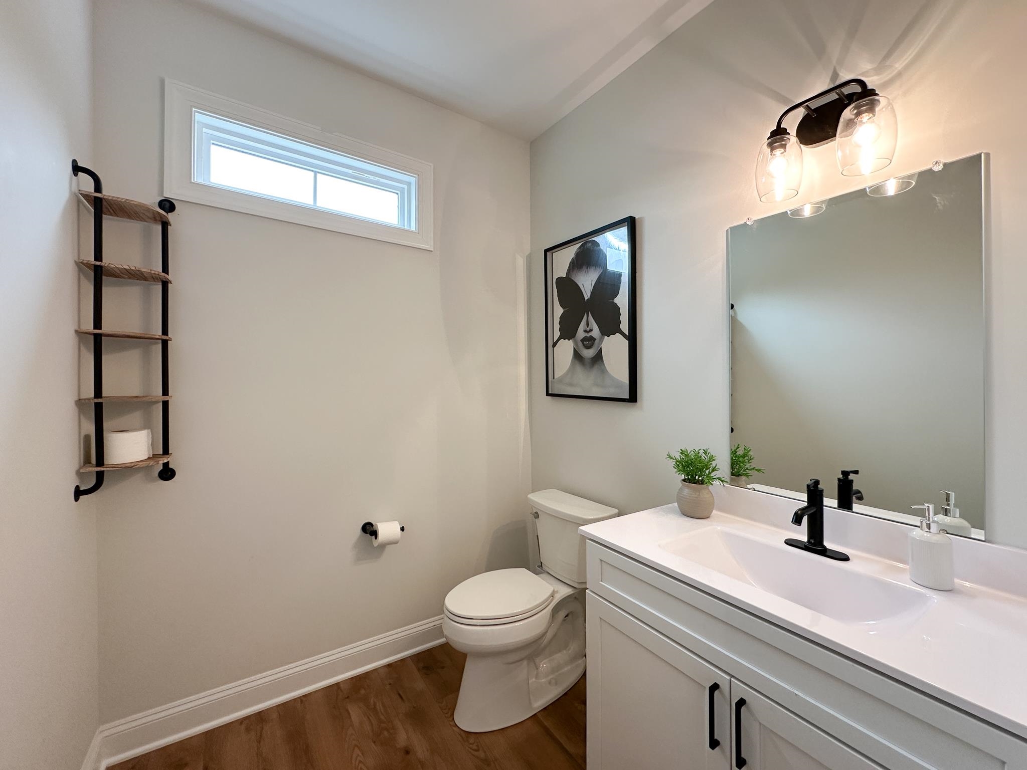55 Mcilwee Lane Staunton, VA 24401 - Photo 24 of 40 a bathroom with a sink a toilet and mirror