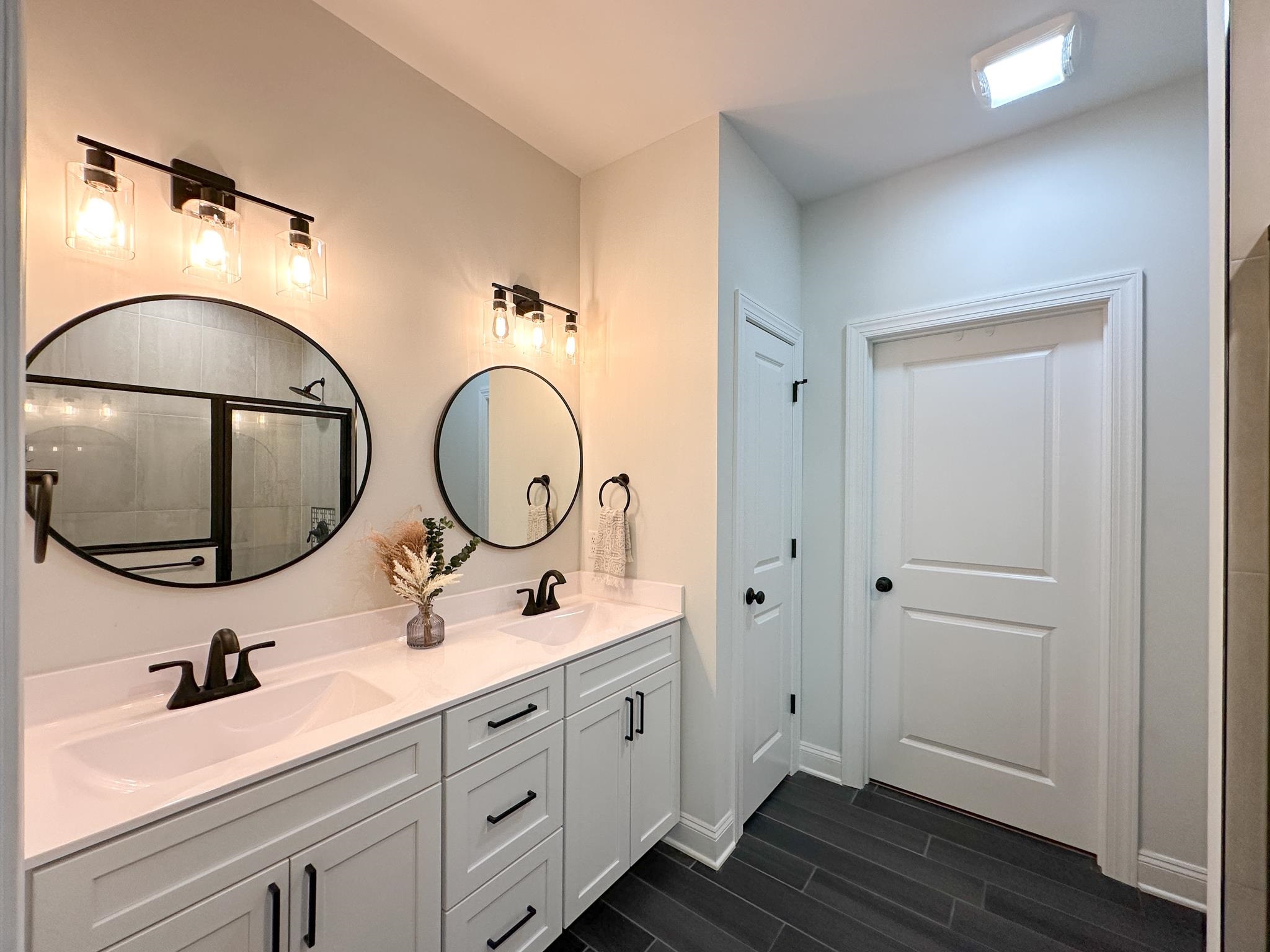 55 Mcilwee Lane Staunton, VA 24401 - Photo 32 of 40 a bathroom with 2 sink and a mirror