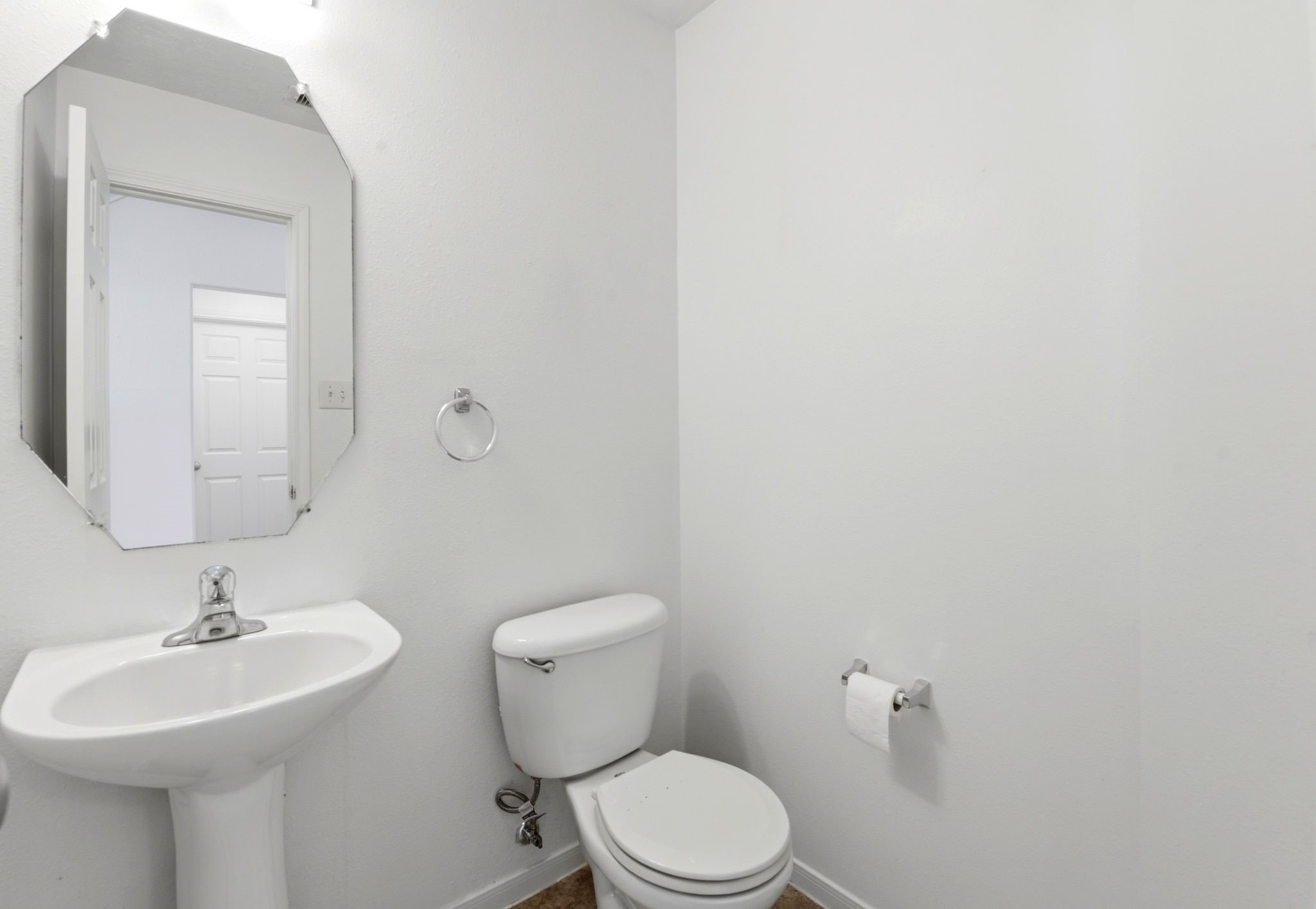 22102 Bridgestone Crossing Drive Spring, TX 77388 - Photo 22 of 38 a bathroom with a sink a toilet and mirror