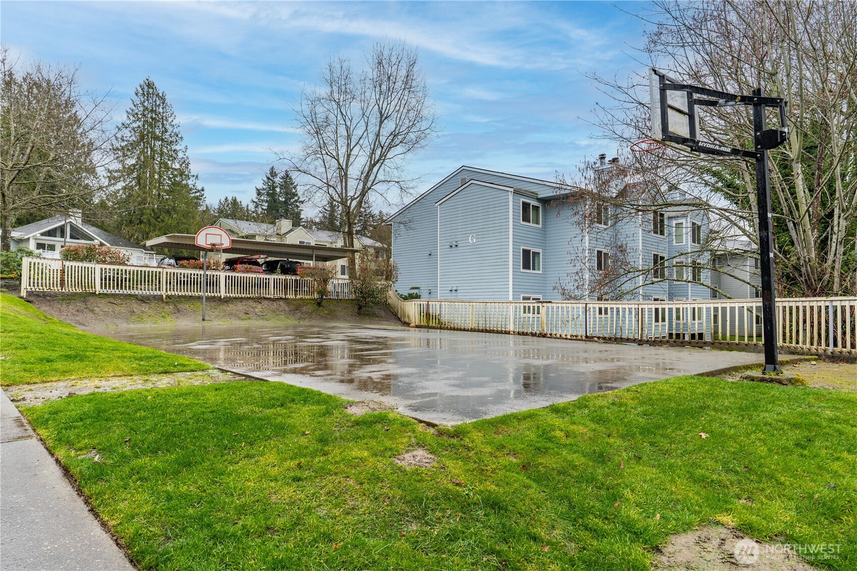 975 Aberdeen Avenue Northeast, Unit F207 Renton, WA 98056 - Photo 21 of 24 a view of a house with a yard from a fountain