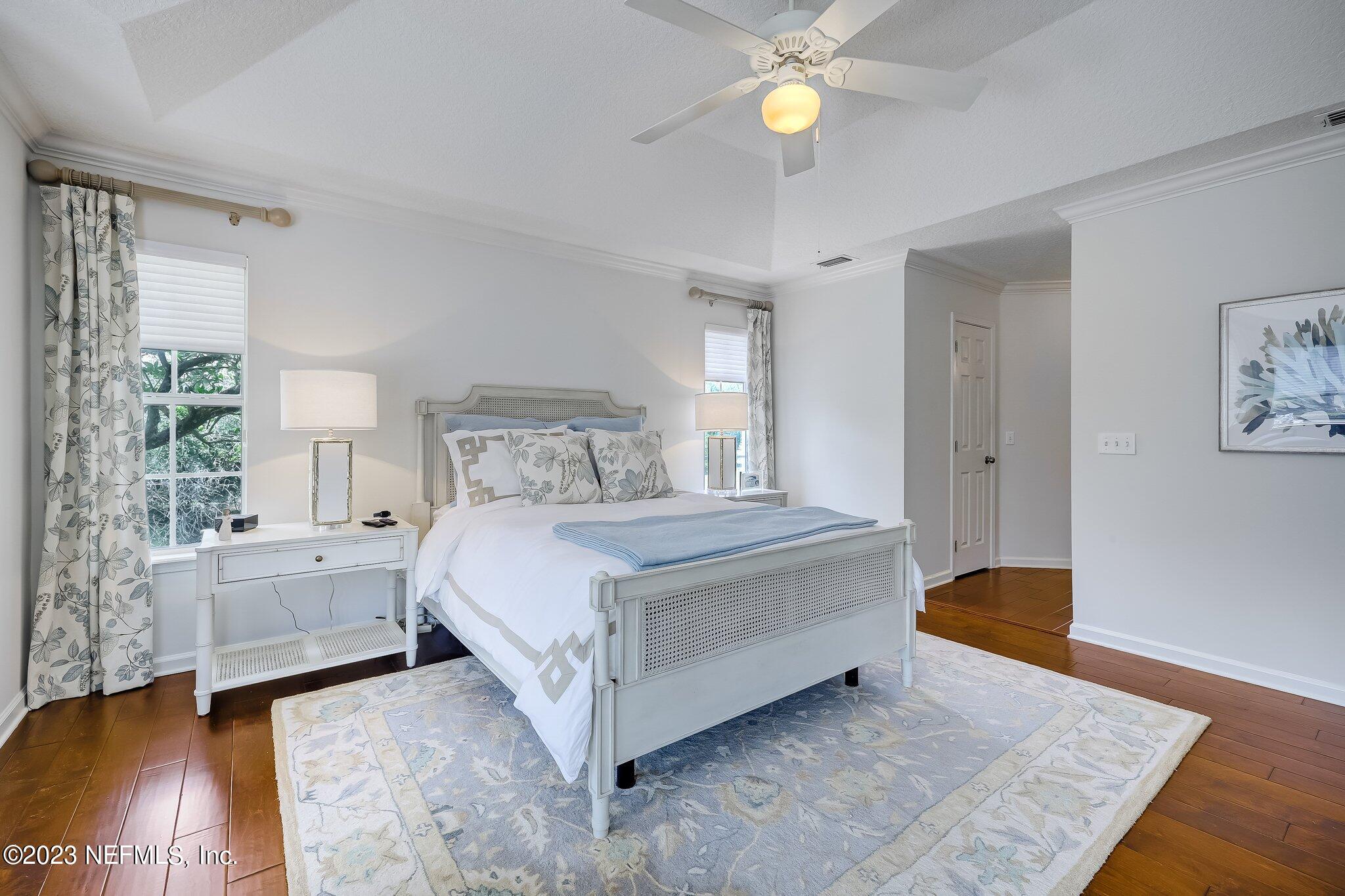 8026 Pine Lake Road Jacksonville, FL 32256 - Photo 22 of 43 a bedroom with a bed and window