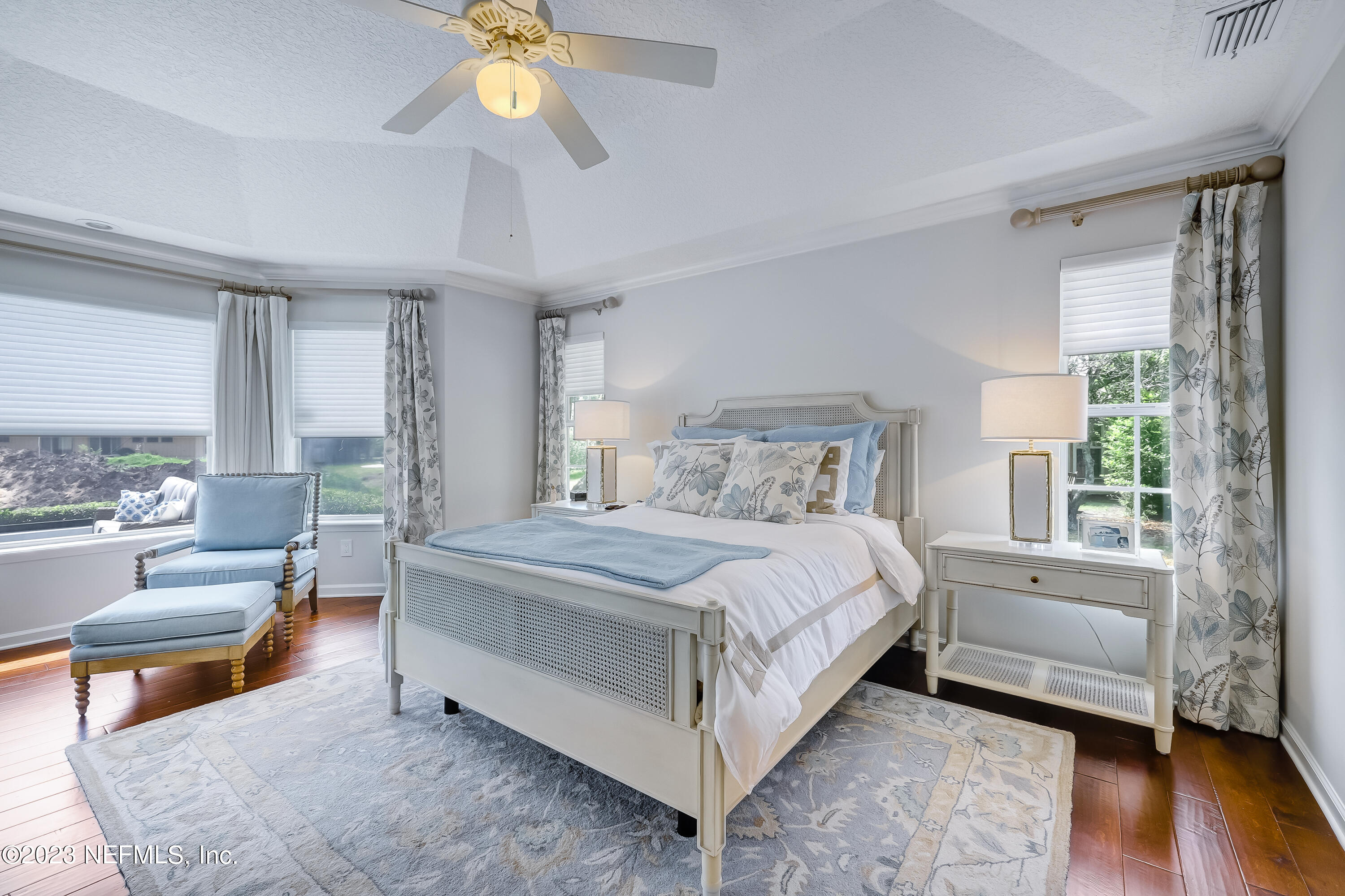 8026 Pine Lake Road Jacksonville, FL 32256 - Photo 23 of 43 a bedroom with a bed a couch and dresser