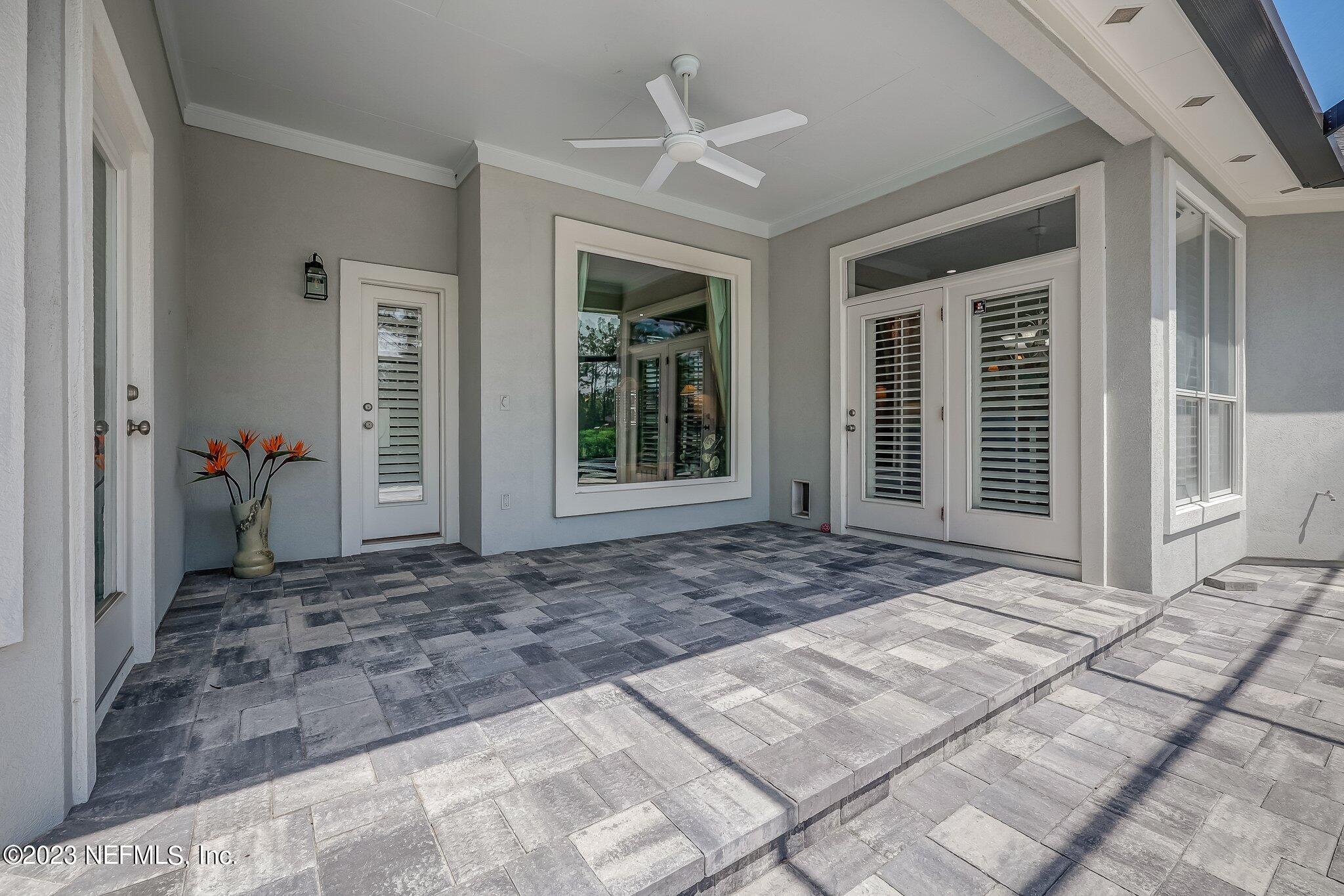 8026 Pine Lake Road Jacksonville, FL 32256 - Photo 32 of 43 a view of a house with backyard porch