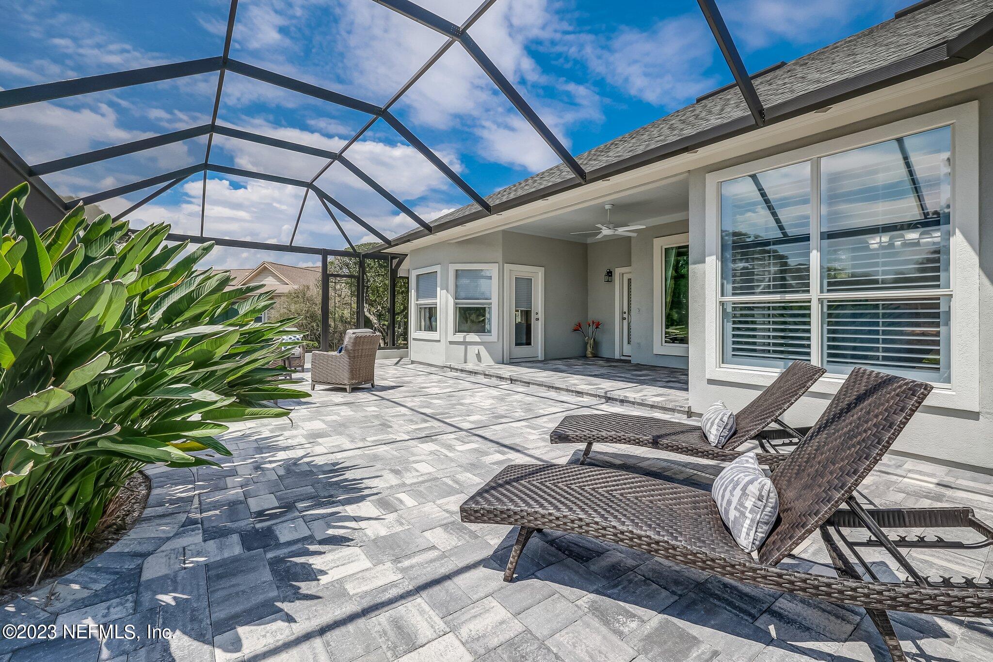 8026 Pine Lake Road Jacksonville, FL 32256 - Photo 33 of 43 a view of a lounge chairs in the patio