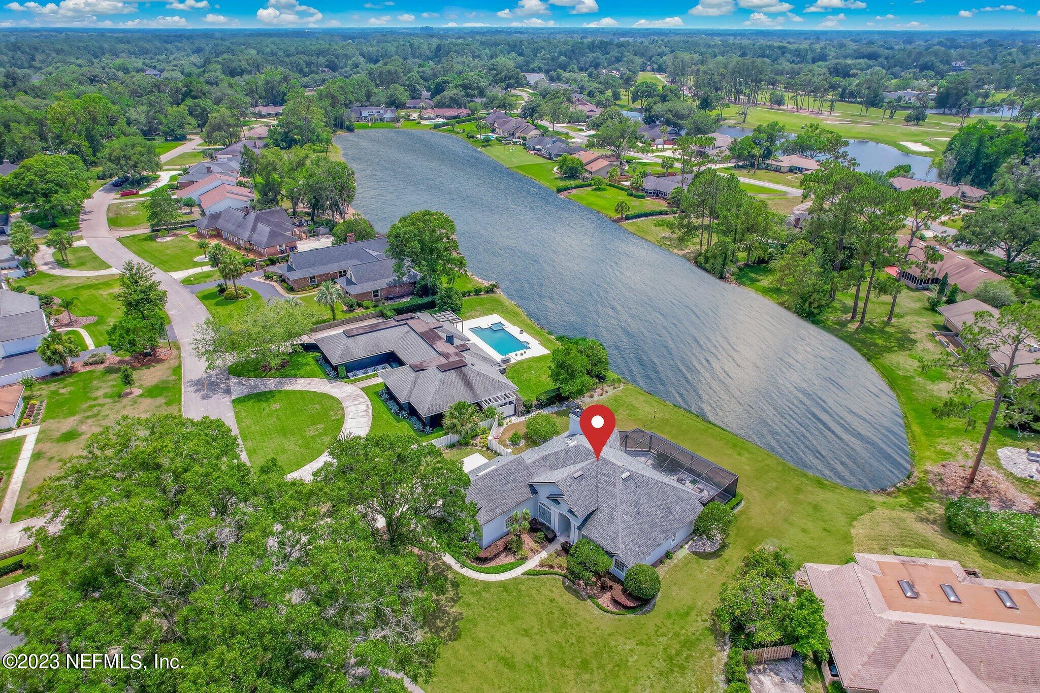 8026 Pine Lake Road Jacksonville, FL 32256 - Photo 37 of 43 an aerial view of residential house with outdoor space and pool view
