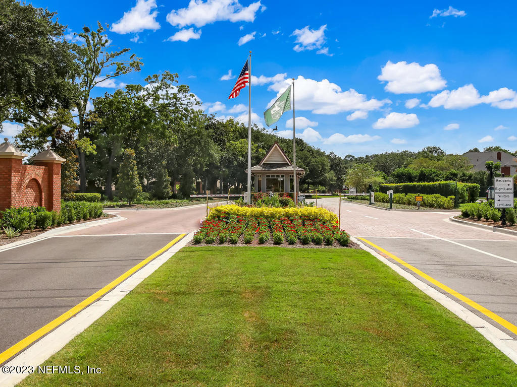 8026 Pine Lake Road Jacksonville, FL 32256 - Photo 42 of 43 a view of a house with swimming pool and a yard
