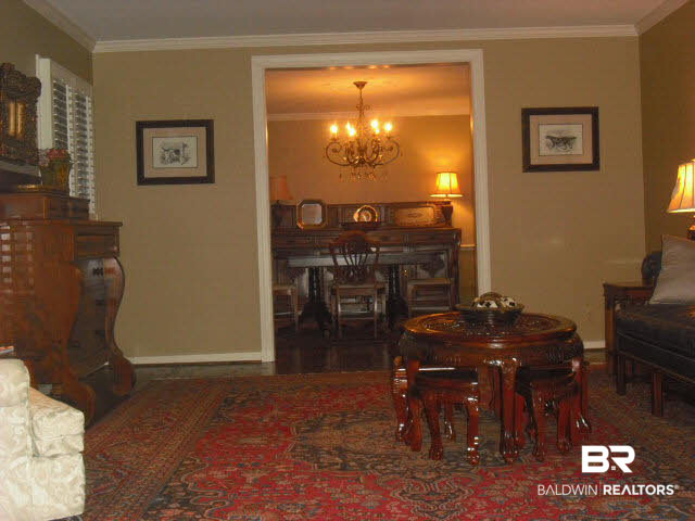 6156 Brandy Run Road South Mobile, AL 36608 - Photo 2 of 16 Hardwood Floors, Interior Wood Blinds Shutters, Neutral Wall Color, Nice Crown Molding and very spacious.