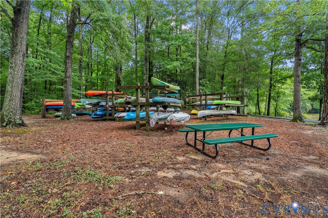 14308 Chimney House Road Midlothian, VA 23112 - Photo 50 of 52 Wooded setting with multiple storage racks for kay