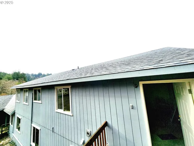 a balcony with wooden floor