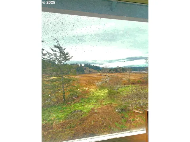 a view of a room with a window