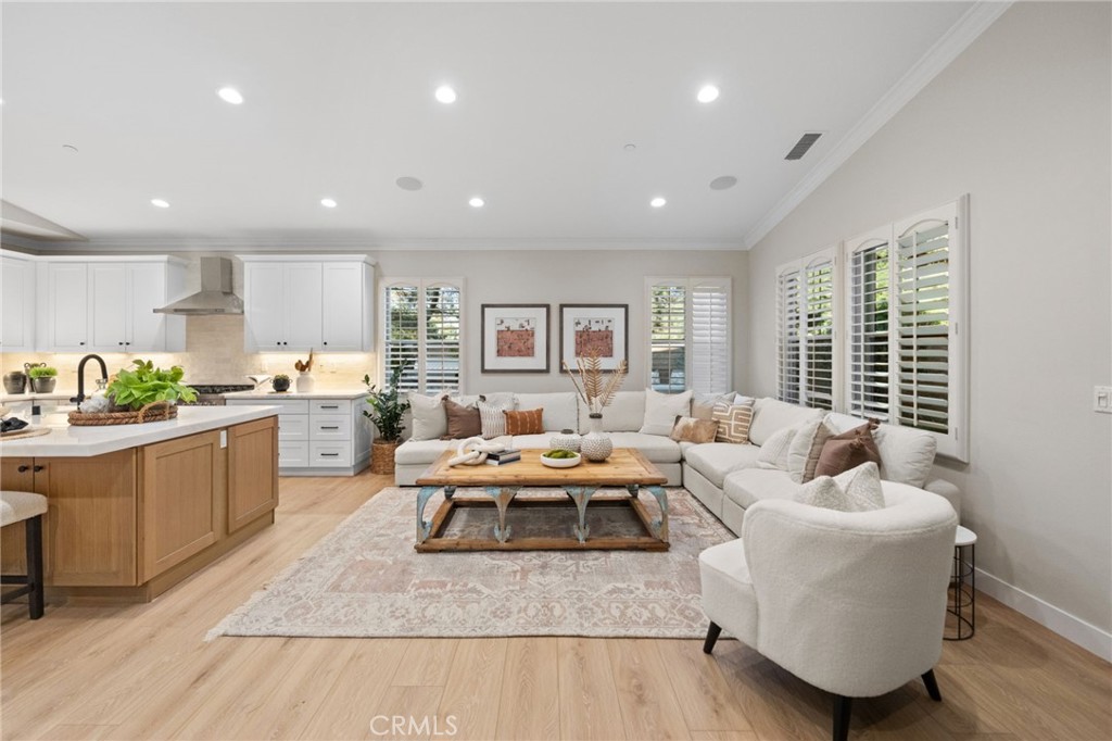 45 Shade Tree Irvine, CA 92603 - Photo 25 of 62 a living room with furniture and a large window