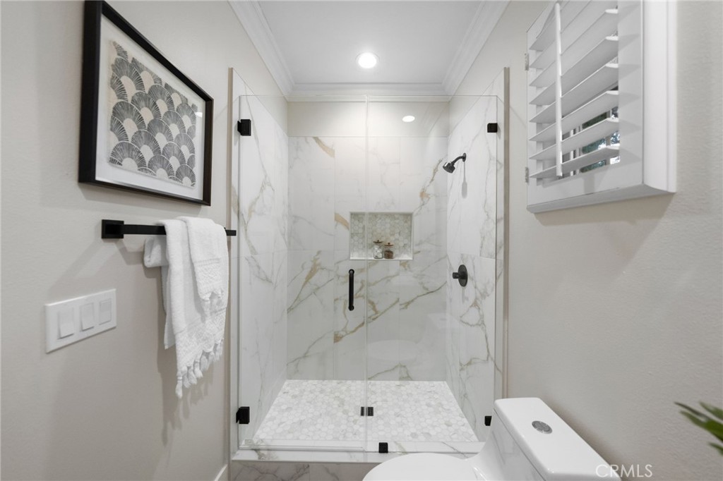 45 Shade Tree Irvine, CA 92603 - Photo 37 of 62 a bathroom with a shower