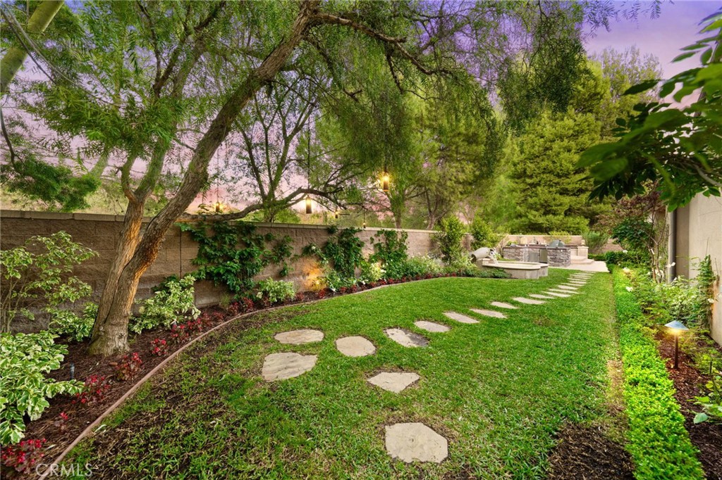 45 Shade Tree Irvine, CA 92603 - Photo 4 of 62 a backyard of a house with a yard and outdoor seating