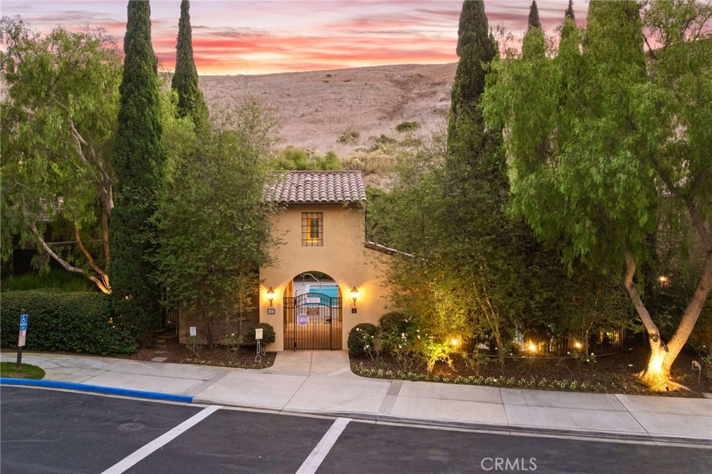 45 Shade Tree Irvine, CA 92603 - Photo 56 of 62 a view of a street with houses