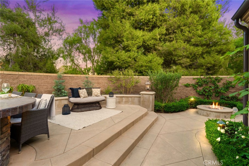 45 Shade Tree Irvine, CA 92603 - Photo 9 of 62 a view of patio with couches and table under an umbrella