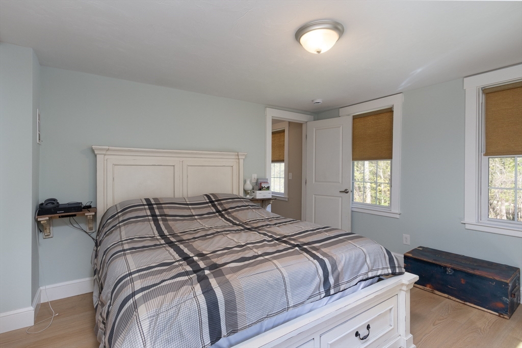 122 Wallace Road Sturbridge, MA 01566 - Photo 11 of 40 a bedroom with a bed and window
