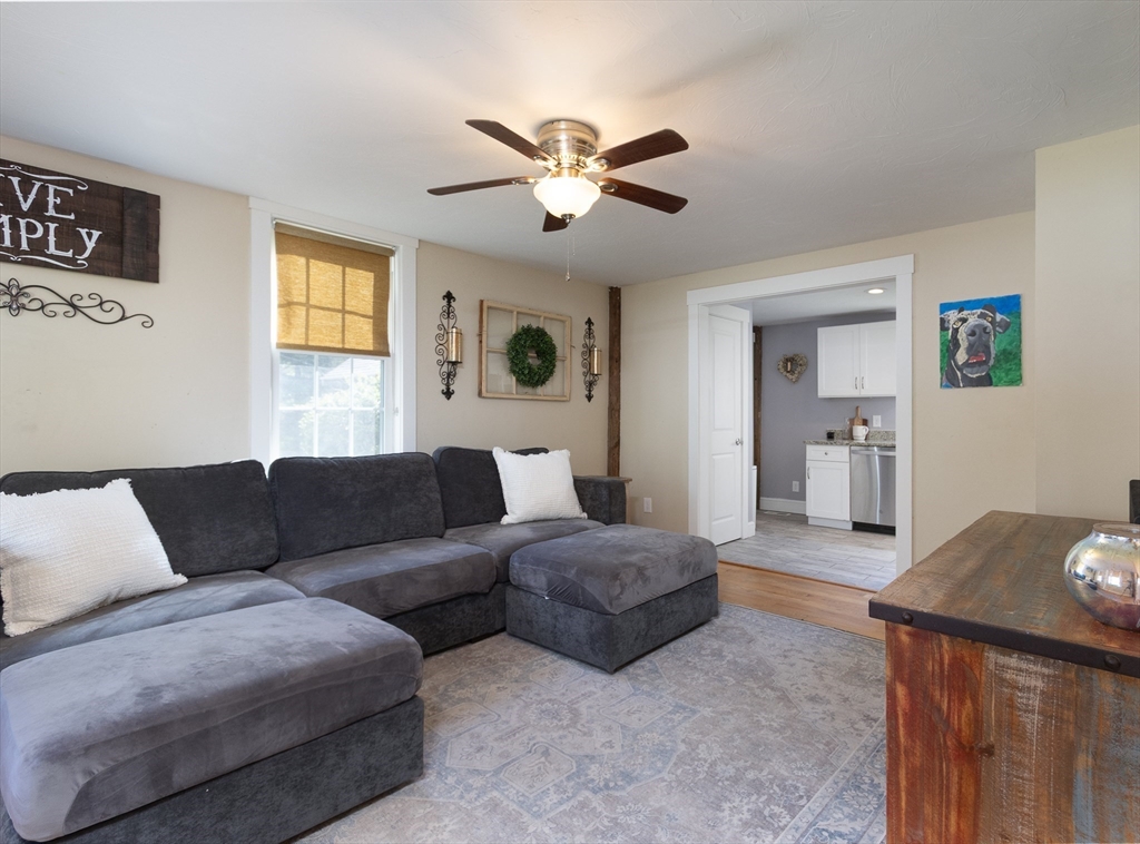 122 Wallace Road Sturbridge, MA 01566 - Photo 2 of 40 a living room with furniture and a window