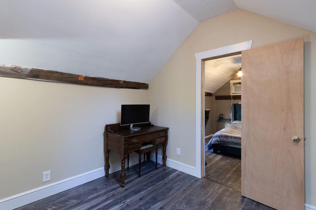 122 Wallace Road Sturbridge, MA 01566 - Photo 28 of 40 a view of a livingroom with wooden floor and a bathroom