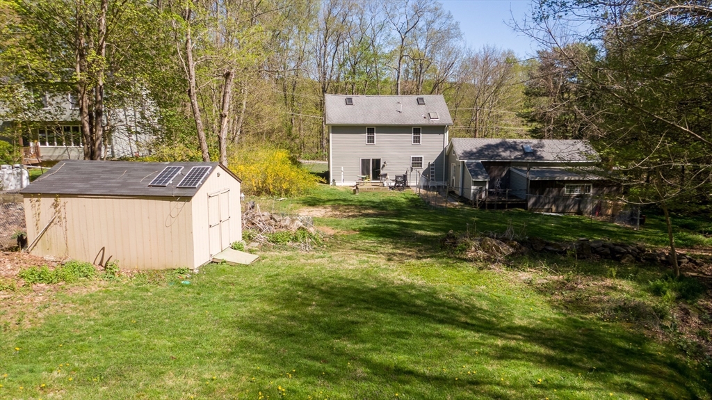 122 Wallace Road Sturbridge, MA 01566 - Photo 31 of 40 a view of a house with a yard