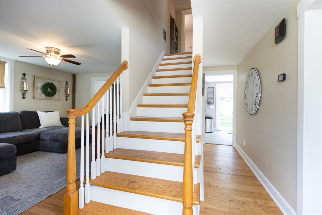 122 Wallace Road Sturbridge, MA 01566 - Photo 4 of 40 a view of entryway and hall with wooden floor