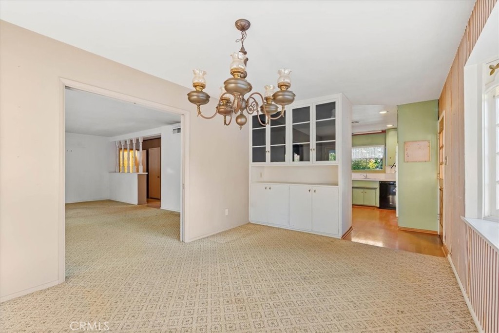 2807 Wyoming Way Riverside, CA 92506 - Photo 11 of 40 wooden floor in an empty room with a window