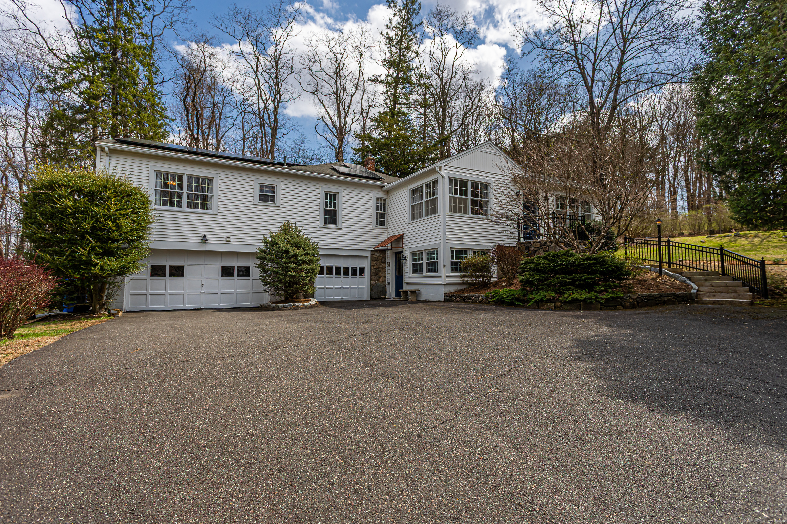 front view of a house with a street