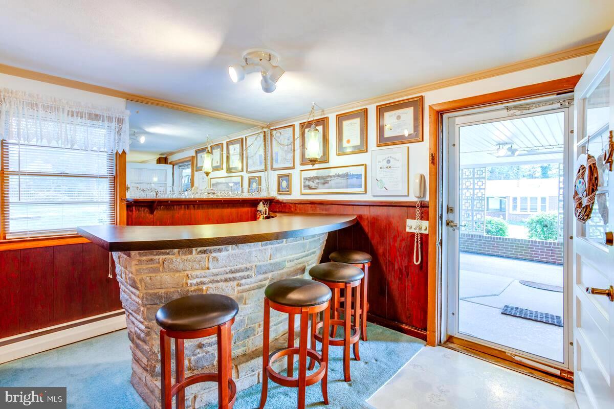31 Cedarhill Road Randallstown, MD 21133 - Photo 43 of 64 Wet Bar in Fam Room & Exit to Carport