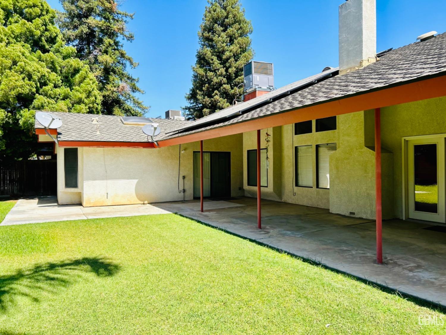 Undisclosed Address Bakersfield, CA 93309 - Photo 14 of 14 a front view of a house with garden