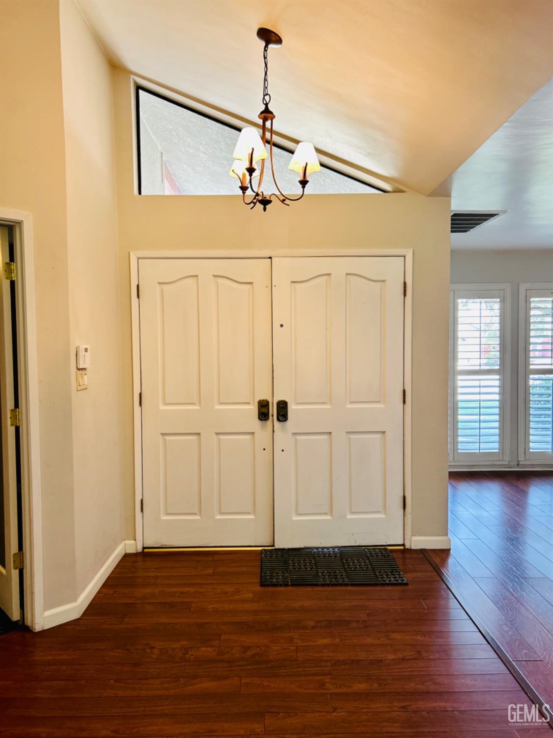 Undisclosed Address Bakersfield, CA 93309 - Photo 3 of 14 a view of a livingroom with wooden floor